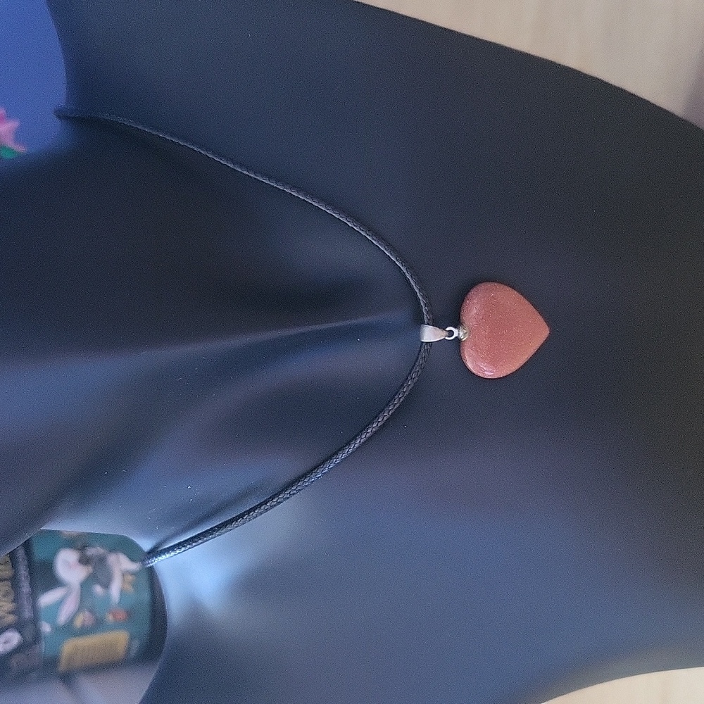 Gold sandstone heart charm